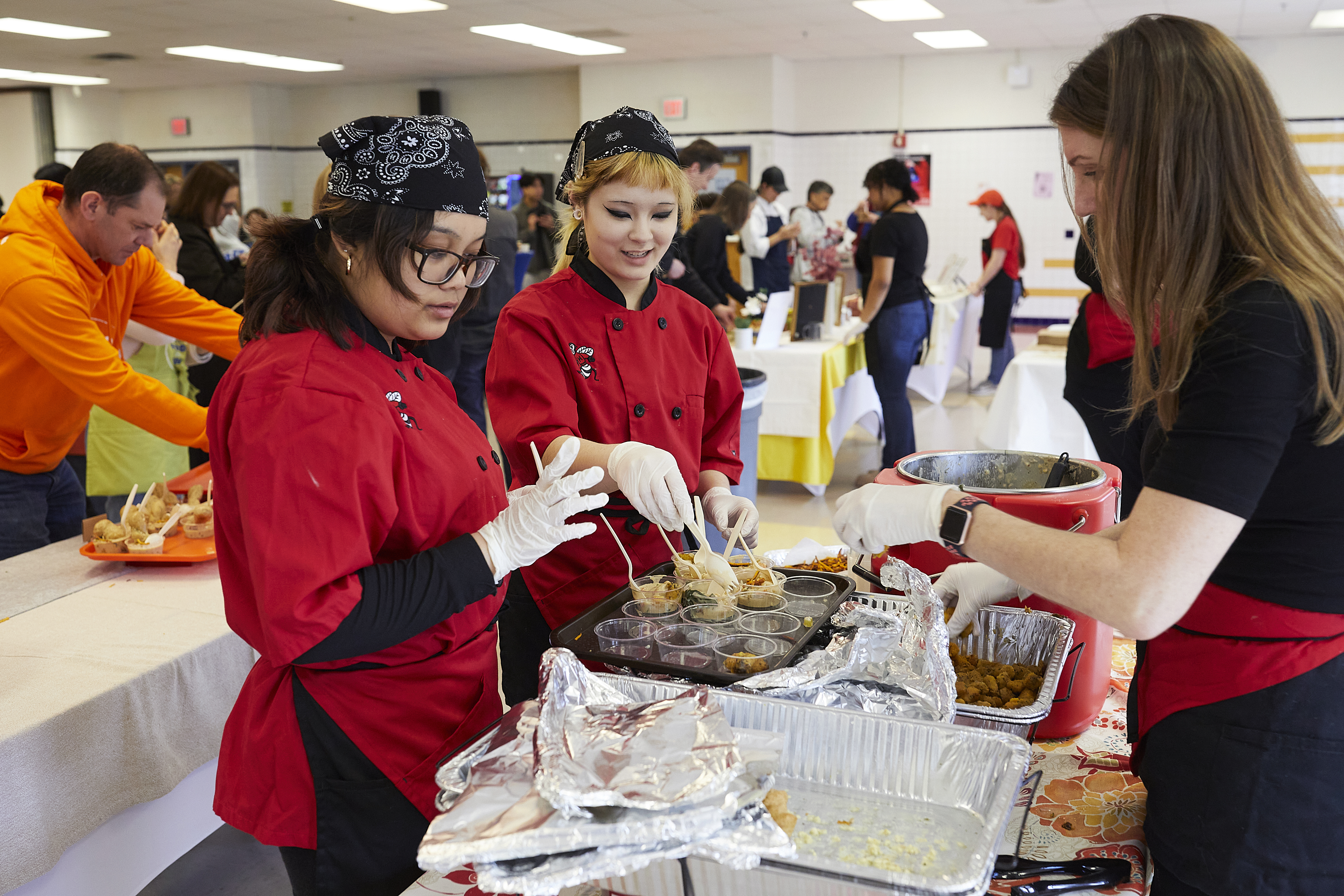 The Herndon High School team prepares samples of their original recipe. (photo courtesy: Real Food for Kids)